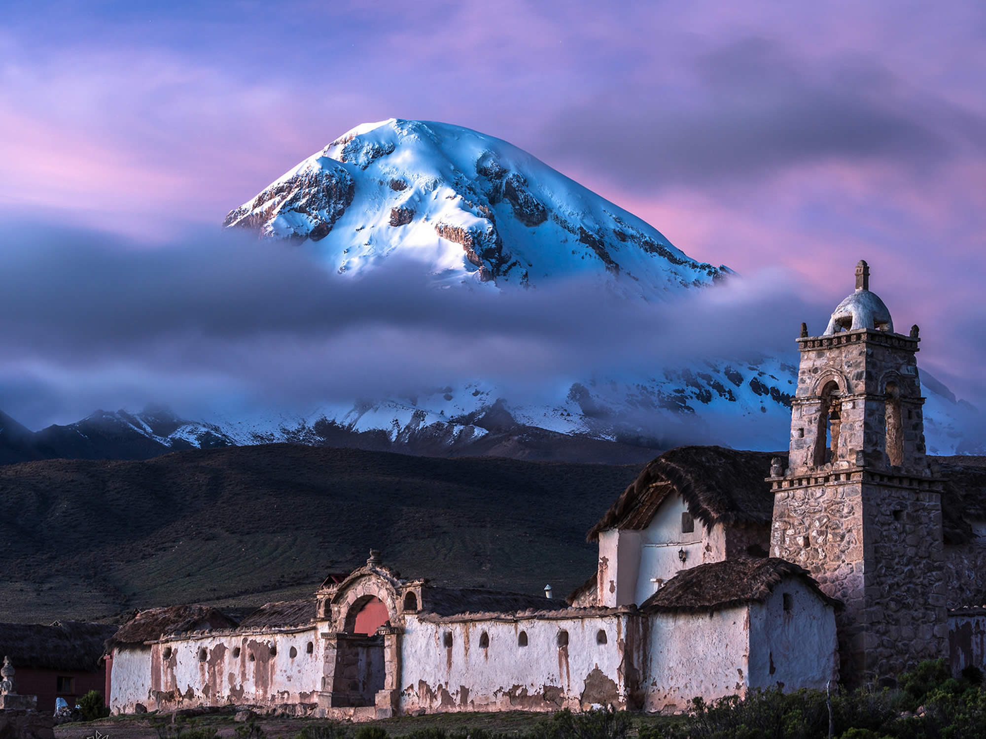 Snowy mountain and old church.